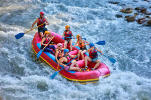 Outdoor Activities In Pigeon Forge: A group of people whitewater rafting